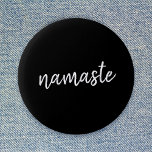 Namaste | Black Yoga Modern Spiritual Meditation 6 Cm Round Badge<br><div class="desc">Simple, stylish "namaste" quote art design in modern minimalist handwritten script typography on a bold black background. The slogan can easily be personalized with your own words for a perfect gift for a yoga bunny or pilates lover! Namasté literally means "greetings to you." In the Vedas, namaste mostly occurs as...</div>