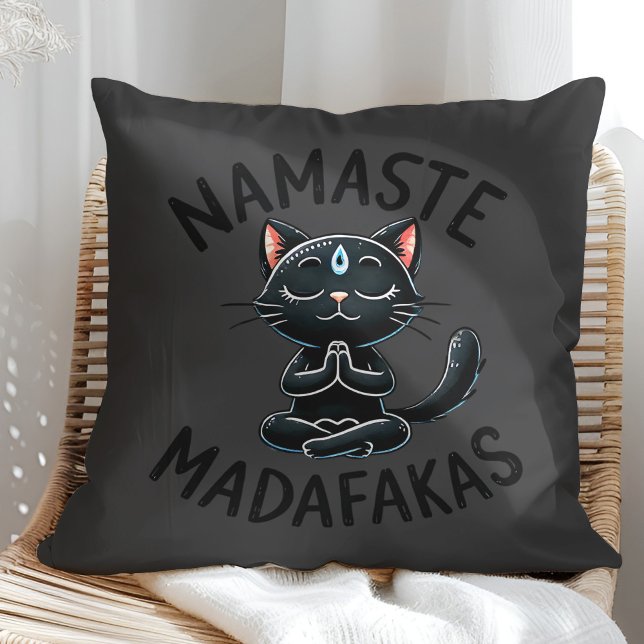 "Namaste Madafakas" Funny Cat Lovers Cushion ("Namaste Madafakas" Funny Cat Lovers Throw Pillow on a sunny boho rattan chair.)