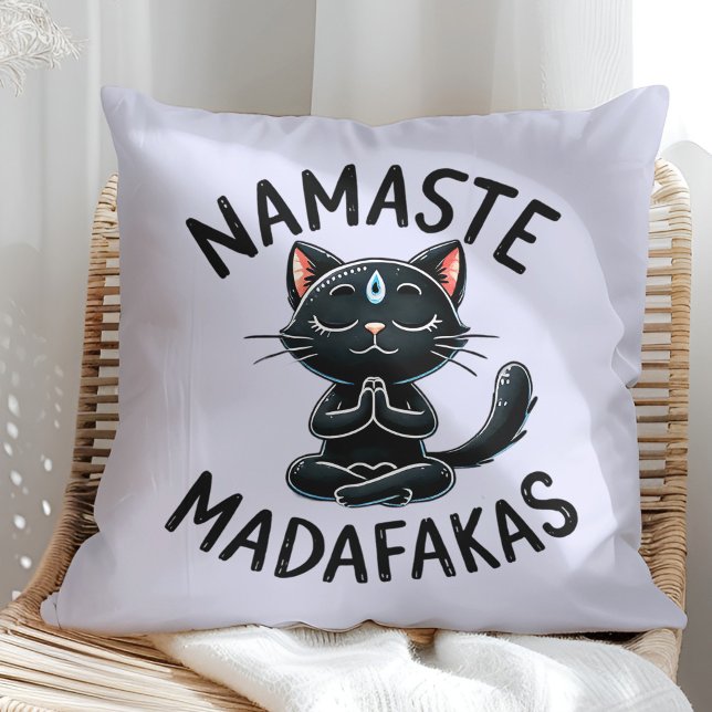 "Namaste Madafakas" Funny Cat Lovers Cushion ("Namaste Madafakas" Funny Cat Lovers Throw Pillow on a sunny boho rattan chair.)