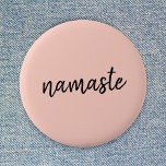 Namaste | Peachy Pink Modern Yoga Meditation 6 Cm Round Badge<br><div class="desc">Simple, stylish "namaste" quote art design in modern minimalist handwritten script typography on a pastel peachy pink background. The slogan can easily be personalized with your own words for a perfect gift for a yoga bunny or pilates lover! Namasté literally means "greetings to you." In the Vedas, namaste mostly occurs...</div>