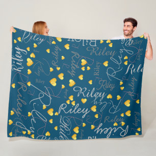 Name and gold hearts replicated on blue fleece blanket