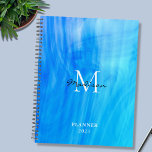 Name Monogram Blue Planner<br><div class="desc">This stylish Planner is decorated with an atmospheric design in shades of blue and turquoise.
Easily customisable with your name,  monogram,  and year.
Use the Design Tool option to change the text size,  style,  and colour.</div>