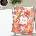 Name Monogram Foliage Planner<br><div class="desc">This colourful Planner is decorated with a watercolor leaves pattern in rusts, yellows, and purples. Easily customisable with your name, monogram, and year. Use the Design Tool option to change the text size, style, and colour. Because we create our artwork you won't find this exact image from other designers. Original...</div>