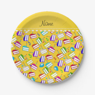 Name yellow rainbow cakes balloons swirls paper plate
