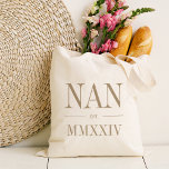 Nan Roman Numeral Year Established Tote Bag<br><div class="desc">A modern minimalist tote bag to celebrate a chic grandma,  this clean minimal tote features "Nan" or your choice of grandma nickname in neutral tan serif lettering. Customise with the year she became a grandmother beneath in elegant roman numerals for a chic touch.</div>