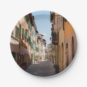Narrow street with old facades in tuscany village paper plate
