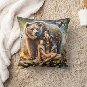 Native American Woman Sitting by River With Bear Cushion