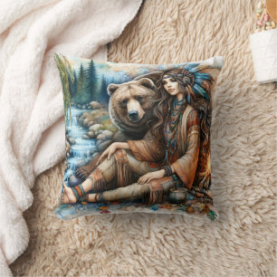 Native American Woman Sitting by River With Bear Cushion