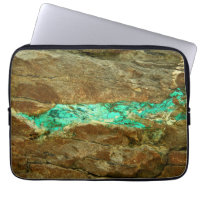 Natural turquoise vein in rough brown stone