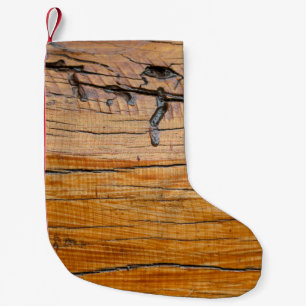Natural wood background, wood slice and organic t small christmas stocking