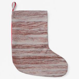 Natural wood texture pattern that is the backgroun small christmas stocking
