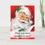 Naughty or Nice Winking Santa Greeting Holiday Card<br><div class="desc">Have you been naughty or nice? Folded Card with Happy Santa Claus is winking one eye while holding his list of naughty and nice children,  or a gift list for the holidays.  Vintage portrait of Santa is fun and jolly with his fluffy white beard and red outfit.</div>