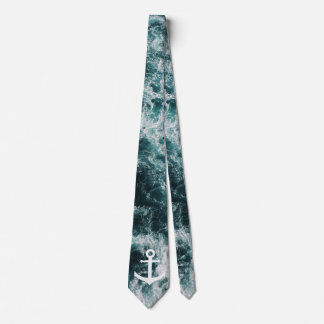 Nautical anchor on ocean photo background tie