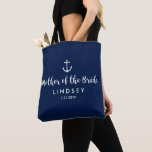 Nautical Anchor Wedding Custom Mother of the Bride Tote Bag<br><div class="desc">Surprise the Mother of the Bride with this personalised tote bag featuring a nautical design with a white anchor set against a navy background. Customise by adding her name and your wedding date. A great size for wedding essentials: make-up, extra shoes and clothing, water, etc. The perfect go-to bag for...</div>