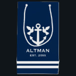 Nautical navy blue & white anchor wedding gift bag<br><div class="desc">Nautical anchor navy blue & white stripe wedding gift bag for bride and groom, guests, friends, family etc. Add your own party favours, gifts and goodies. Small, medium and big sizes. Customisable stringed bags with family name, date of marriage and anchored doves logo. Blue and white or customisable colours. Classy...</div>