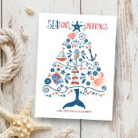 Nautical Seas and Greetings Beach Christmas Tree Holiday Card<br><div class="desc">Beach inspired holiday greeting card features a pattern of tropical fish,  lighthouse,  whale tail,  seashell,  starfish,  crab,  sand dollar,  sailboat,  seahorse and captain's wheel in the shape of a Christmas tree with "SEAson's Greetings" in a cool nautical font. Original artwork KL Stock.</div>