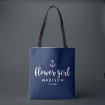 Nautical Wedding White Anchor Custom Flower Girl Tote Bag<br><div class="desc">Surprise your Flower Girl with this personalised tote bag featuring a nautical design with a white anchor set against a navy background. Customise by adding her name and your wedding date. A great size for wedding essentials: extra clothing, shoes, snacks, water, etc. The perfect go-to bag for a nautical, beach...</div>