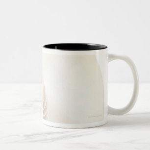 Nautilus shell, close-up Two-Tone coffee mug