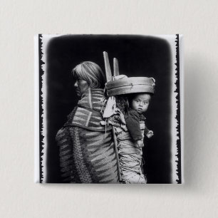 Navaho woman carrying a papoose on her back 15 cm square badge