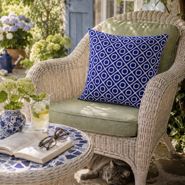 Navy and White Circles Cushion (Bold blue geometry brings timeless style to a peaceful garden retreat.)