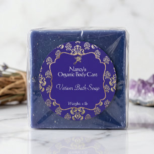 Navy blue and gold foil damask product label