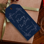 Navy Blue Bow Whimsical Unique Christmas Gift Tags<br><div class="desc">Create unique holiday gift tags with this Whimsical Christmas Gift Tag Design. Featuring hand drawn bows and ribbons illustrations,  modern layout,  handwritten calligraphy fonts in a festive navy blue & white aesthetic. These holiday gift tags are the perfect finishing touch to your gift wrapping this season.</div>