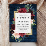 Navy Blue Burgundy Blush Pink Gold Rustic Wedding Invitation<br><div class="desc">Design features a dark navy blue barn wood grain plank background decorated with an elegant floral wreath of peony rose flowers, eucalyptus greenery and more in shades of burgundy, Marsala red, maroon, blush pink etc. Design also features a printed gold coloured border underneath the floral wreath for a modern look....</div>