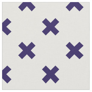 Navy blue cross stitches on white fabric