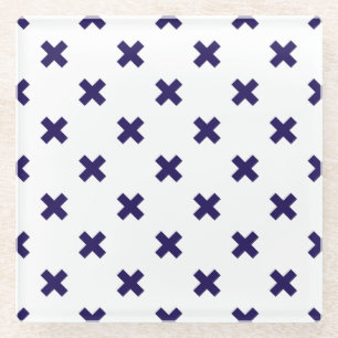 Navy blue cross stitches on white glass coaster