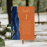 Navy Blue Gold Agate Burnt Orange Wedding Table Number<br><div class="desc">The left-hand edge of this elegant modern wedding table number card features a navy blue watercolor agate border trimmed with faux gold glitter. The word "table" appears in gold-coloured handwriting script on a burnt orange background. Add the names of your guests who are assigned to each table.</div>