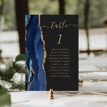 Navy Blue Gold Agate Dark Wedding Table Number<br><div class="desc">The left-hand edge of this elegant modern wedding table number card features a navy blue watercolor agate border trimmed with faux gold glitter. The word "table" appears in gold-coloured handwriting script on an off-black background. Add the names of your guests who are assigned to each table.</div>