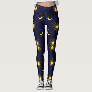 Navy blue leggings with a pattern of yellow suns 