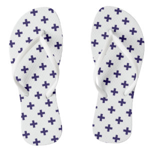 Navy blue polka crosses on white thongs