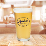 Navy Blue Stylised Wedding Best Man Name Glass<br><div class="desc">Beer glass for the wedding Best Man that features his name printed in navy blue, stylised script inside a navy blue colour oval border along with wedding date. A great party supply idea for a bachelor party! Personalise your beer glass by editing and replacing name and date with your own....</div>