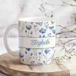 Navy Blue Watercolor Wildflowers Poppy Script Name Coffee Mug<br><div class="desc">Start your day with a touch of elegance using the "Navy Blue Watercolor Wildflowers Poppy Script Name Coffee Mug." This beautiful mug features a delicate watercolor design of navy blue wildflowers, with a striking poppy accent, creating a serene and calming aesthetic. The design is complemented by a personalised script name,...</div>