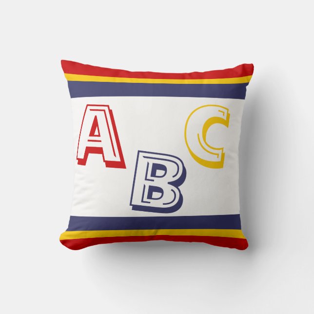 navy blue, yellow, and red ABC on white Cushion (Front)