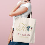 Navy Gold Wine Floral Custom Wedding Bridal Party Tote Bag<br><div class="desc">Elegant custom tote bag features a script initial accented with a beautiful watercolor floral bouquet in navy blue,  wine red,  and blush pink with greenery. Personalise the initial,  first name,  and bridal party title. Makes a unique gift for your bridesmaids and other members of your bridal party.</div>