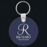 Navy Personalised Groomsman's Name and Monogram Key Ring<br><div class="desc">Elegant Black and White Personalised Groomsman Gifts featuring personalised monogram in white elegant script font style with groomsman's name and title in classic serif font style on navy blue background. Also perfect for best man, father of the bride, bridesmaid, maid of honour, flower girl, mother of the bride and more....</div>
