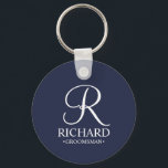 Navy Personalised Groomsman's Name and Monogram Key Ring<br><div class="desc">Elegant Black and White Personalised Groomsman Gifts featuring personalised monogram in white elegant script font style with groomsman's name and title in classic serif font style on navy blue background. Also perfect for best man, father of the bride, bridesmaid, maid of honour, flower girl, mother of the bride and more....</div>