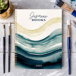 Navy Watercolor Flow 2025 Custom Name Planner<br><div class="desc">Immerse yourself in the fluidity of art and organisation with this captivating planner. Navy watercolor waves flow across the cover, creating a sense of movement and tranquillity. Imagine yourself gliding through your schedule with the same effortless grace. Personalise it with your name and let this planner be your artistic companion...</div>