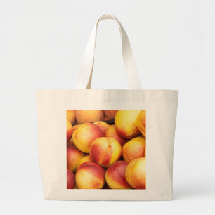 Nectarines background large tote bag