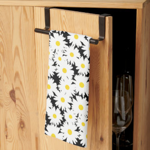 Negative Space Daisies white yellow on black Tea Towel