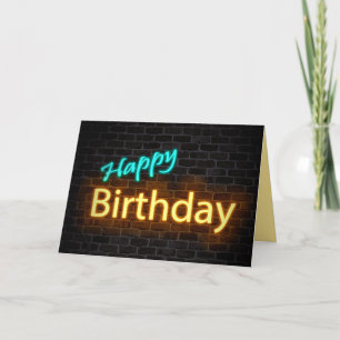 neon happy birthday sign on brick card