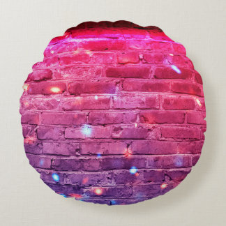 Neon light: empty brick wall. round cushion