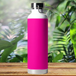 Neon Pink Solid Colour Water Bottle<br><div class="desc">A vibrant and electrifying pink that is full of energy and excitement.Reminiscent of neon signs illuminating a bustling city nightlife or the vivid hues of tropical flowers,  this colour is bold,  playful,  and unapologetically lively.Perfect for making a striking statement.</div>