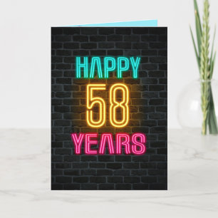 Neon sign on brick for 58th birthday card