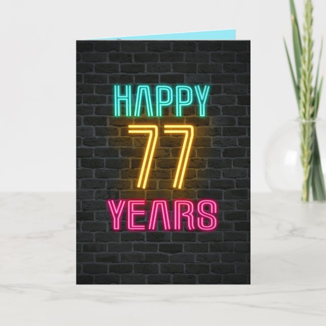 Neon sign on brick for 77th birthday card (Front)