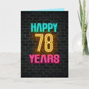 Neon sign on brick for 78th birthday card