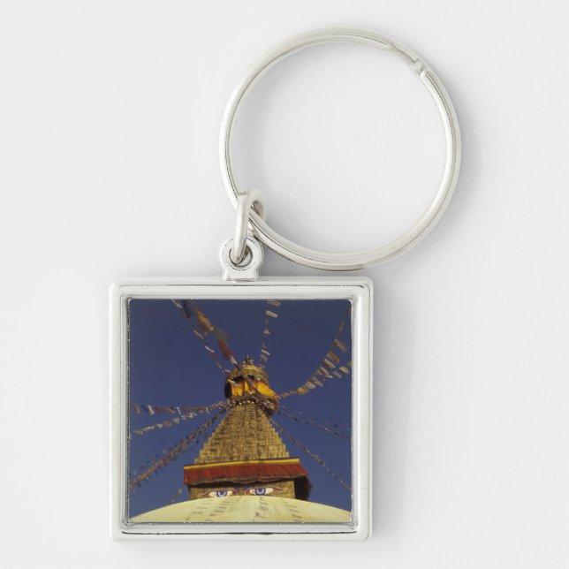 Nepal, Kathmandu. Under prayer flags, watchful Key Ring (Front)