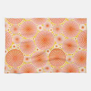 Nested wheels - orange and gold tea towel